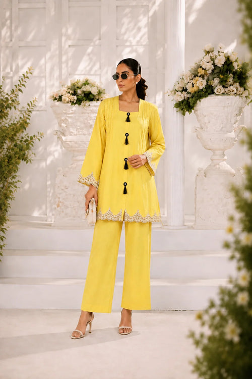 Powder yellow pintuck kurta with black tassel buttons, wide-leg trouser, Zurra Studio-1