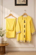 Powder yellow pintuck kurta with black tassel buttons, wide-leg trouser, Zurra Studio-4